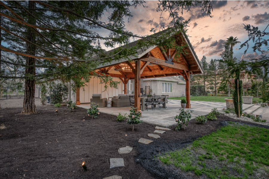 17x23 timber frame pavilion and concrete pavilion by trees