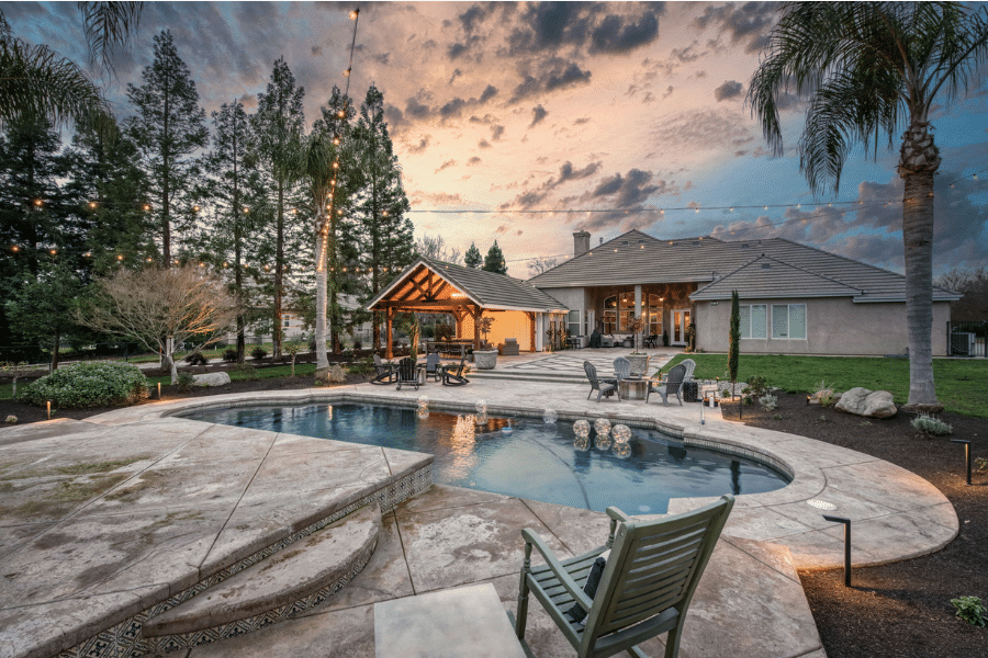 17x23 timber frame pavilion and patio by pool