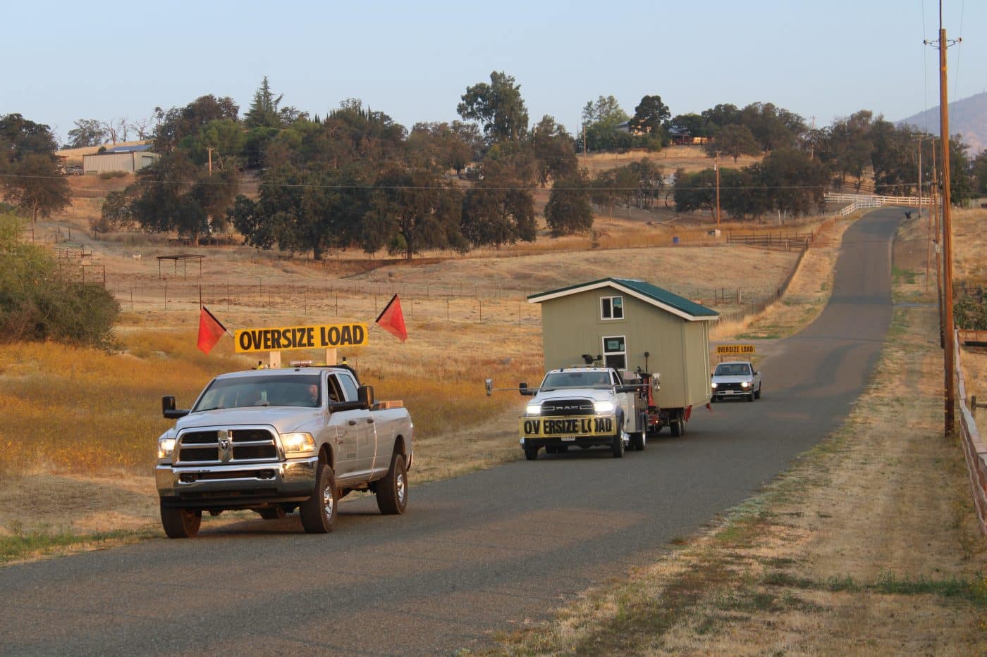 shed being transported down the road