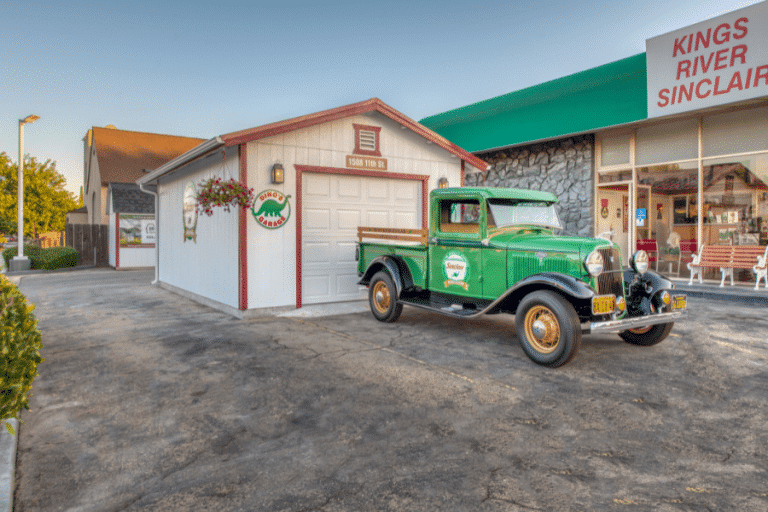Dino's garage 14x20 Garage in reedley, CA with restored green ford in front of it