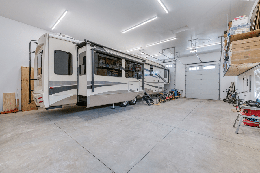 RV and shelving inside 32x50 garage