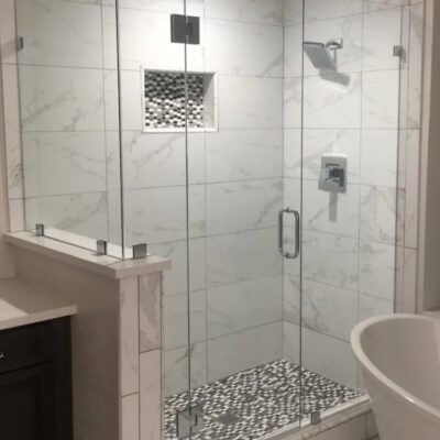 Tile Shower with glass sides in a modern bathroom