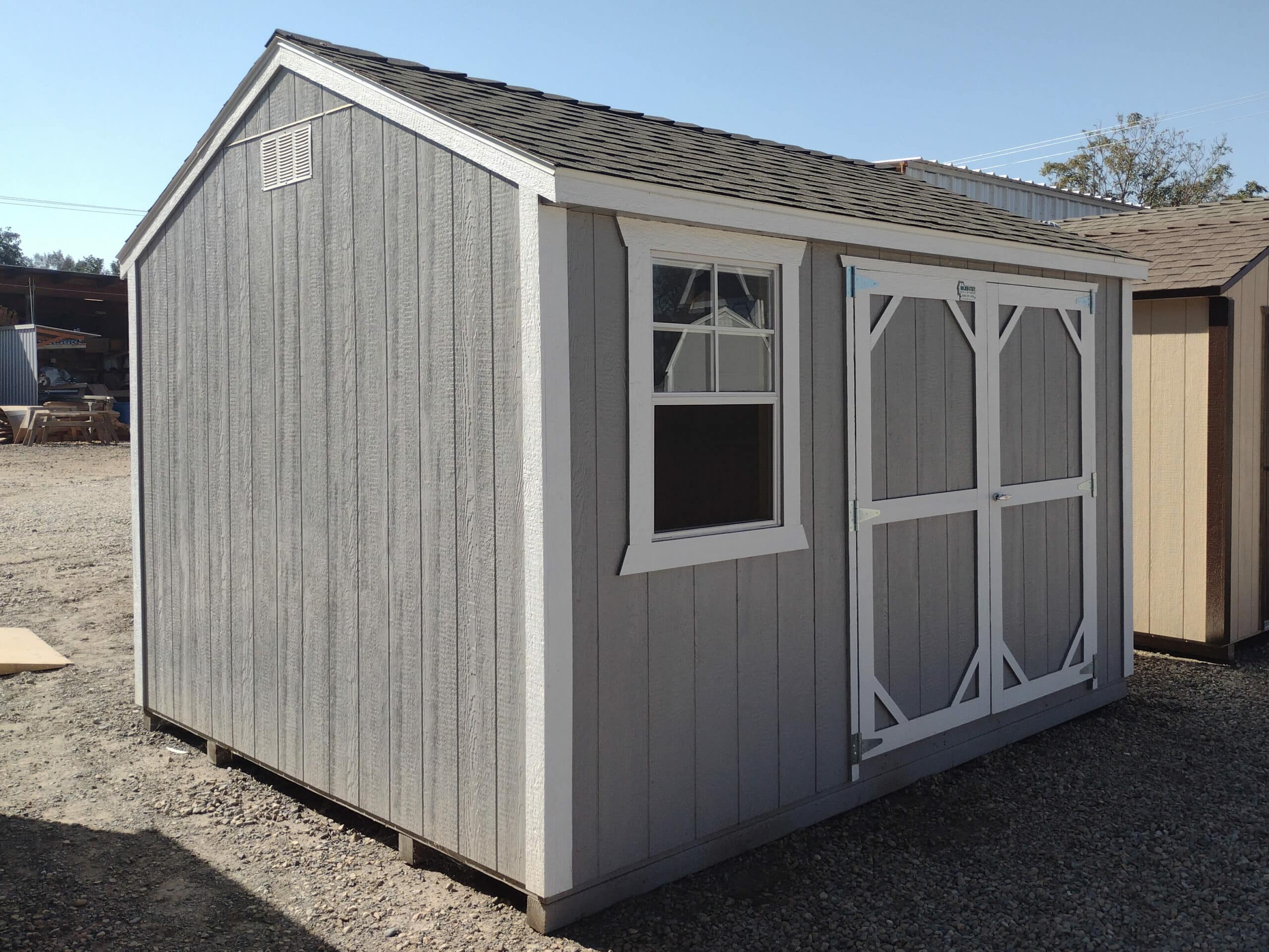 blue ranch elite sheds with white trim