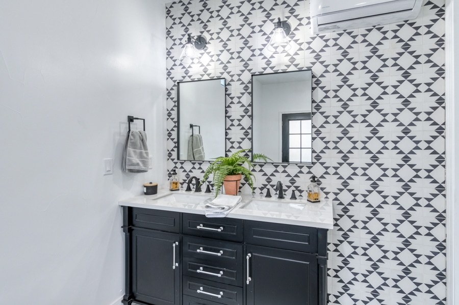 close up of double vanity inside 14x12 outdoor bath house