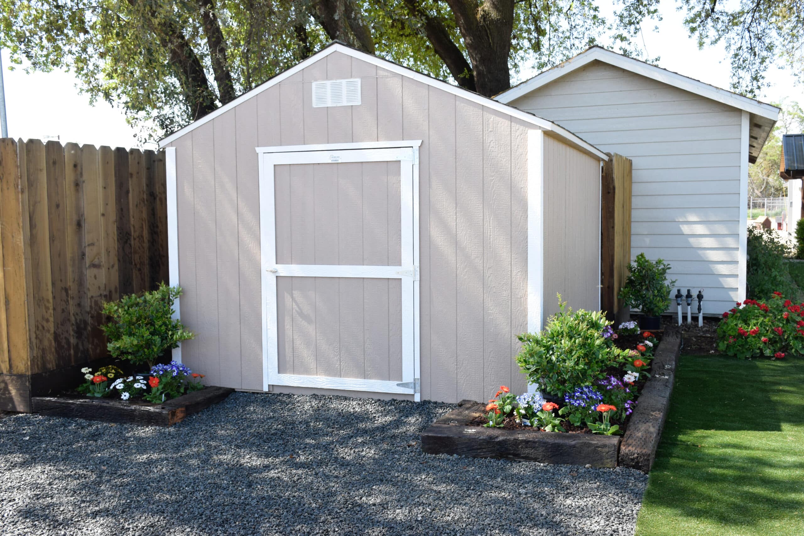 cream and white trimmed rancher value sheds in Dinuba CA