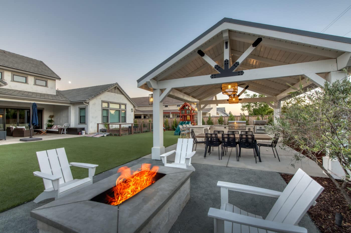 custom pavilions by patio with fire pit and seating area