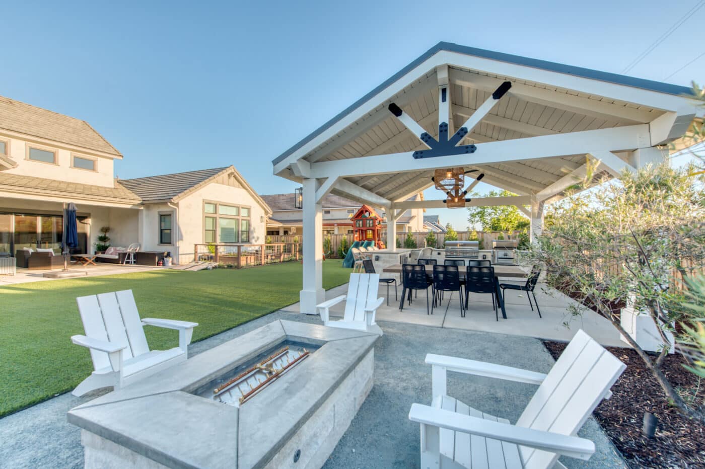 custom pavilions in Visalia CA next to fire pit on concrete pad