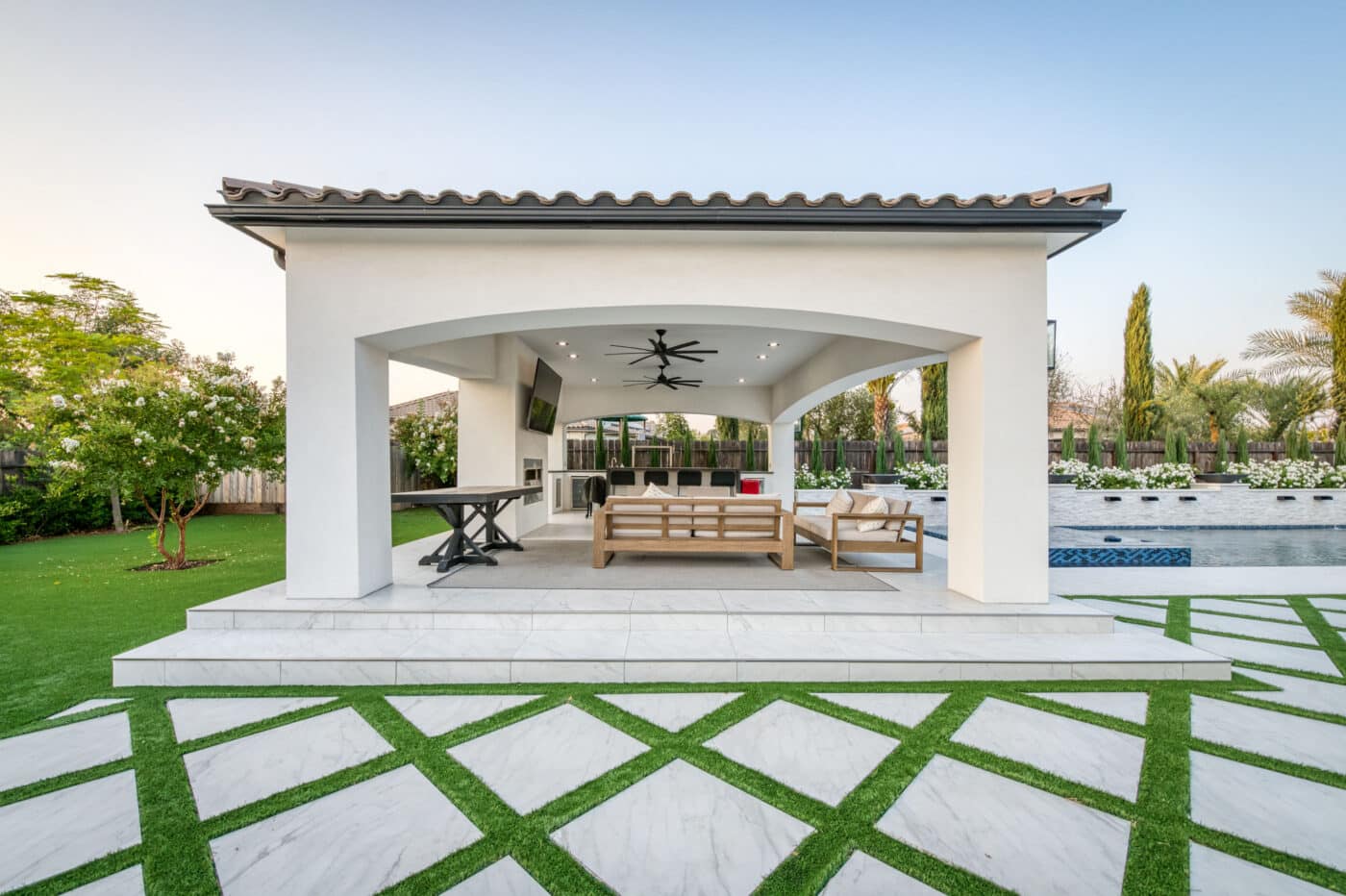 white custom pavilions near Oakhurst CA with seating and outdoor kitchen area