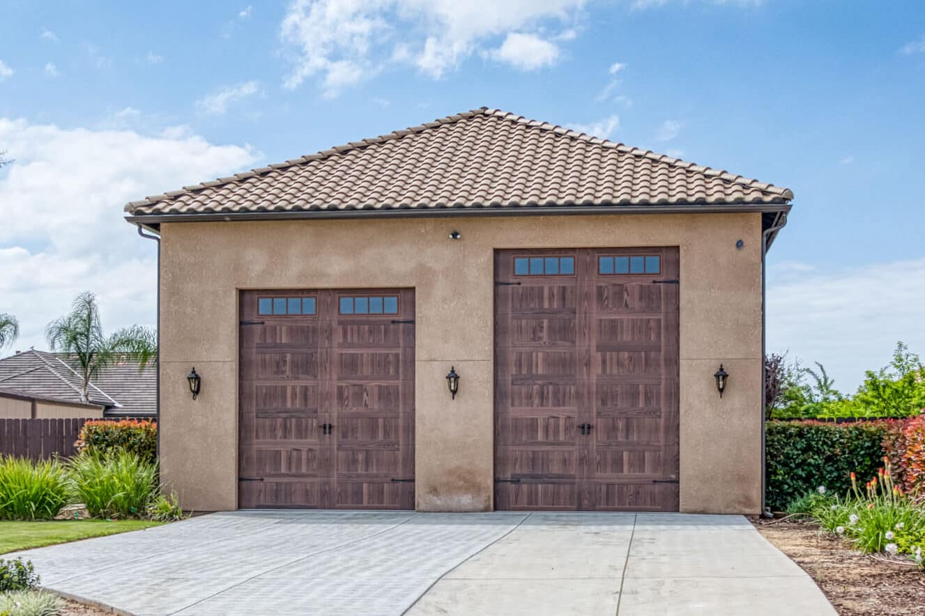 custom tan garages near Madera CA with two brown garage doors