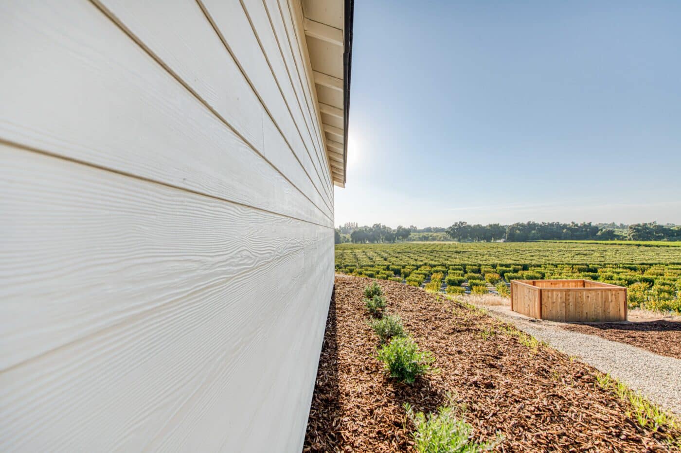 durable cream colored siding on the side of garages near Lemoore CA