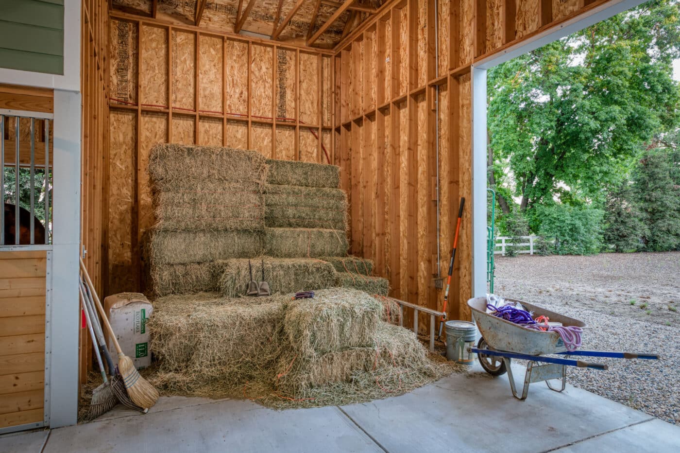 hay inside custom horse barns