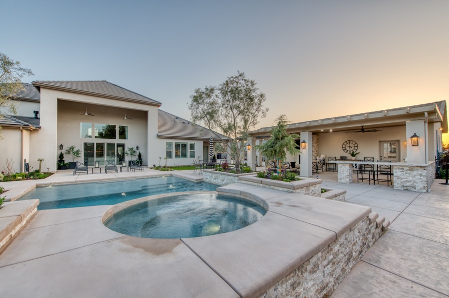 look at patio attched to 30x50 garage by backyard pool