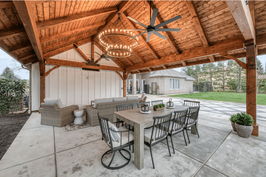 outdoor dining table under timber frame pavilion in California