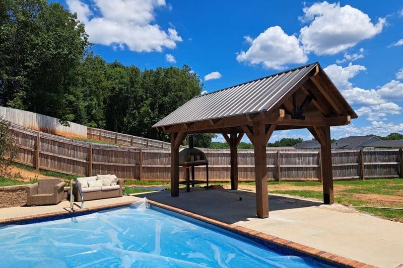 pavilion by pool that can be used as hot tub cover