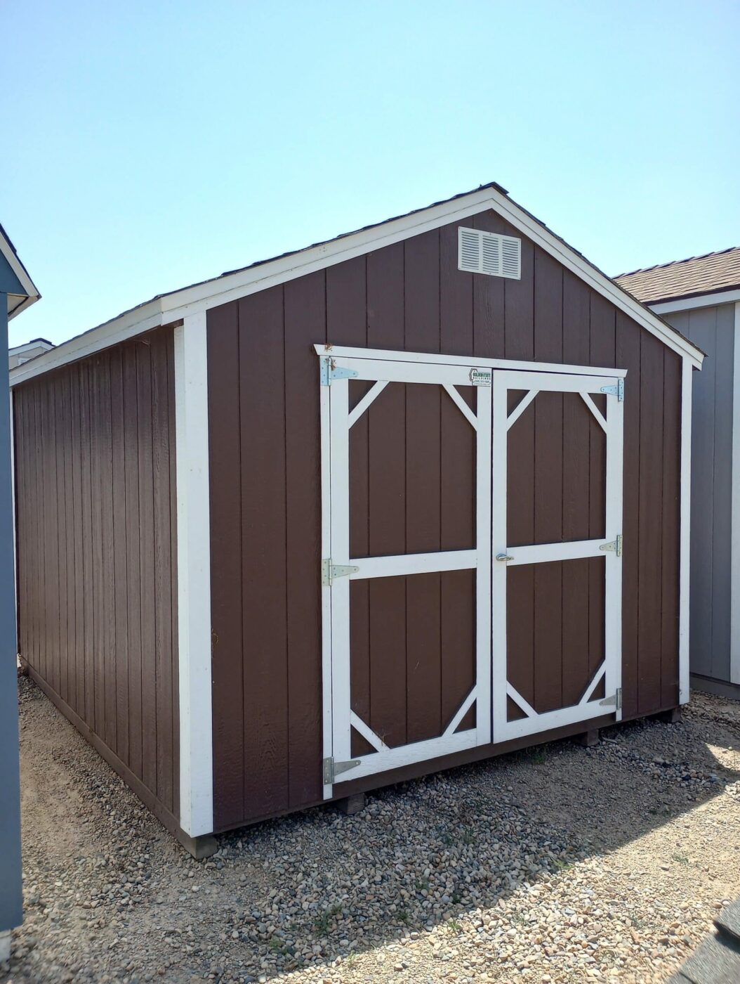 red rent to own sheds in Clovis CA with white trim