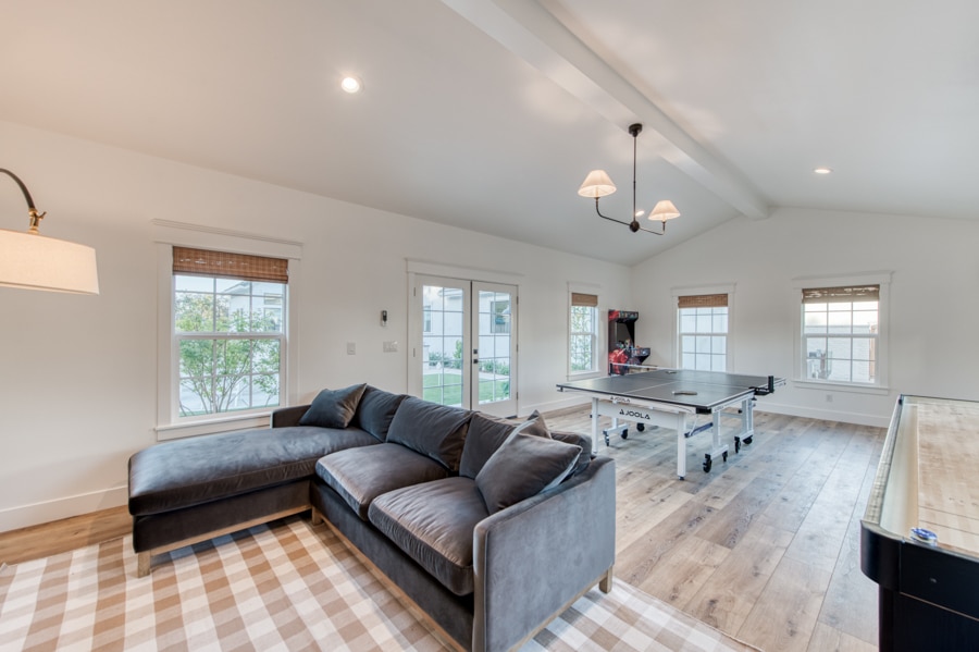 seating area inside 16x30 pool house and game room