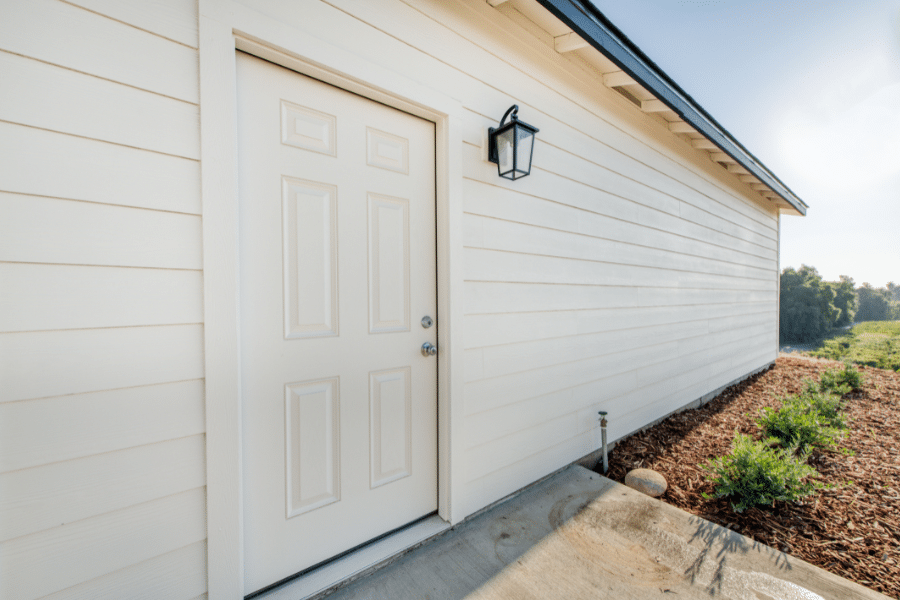 side door with light on 24x30 2-car garage