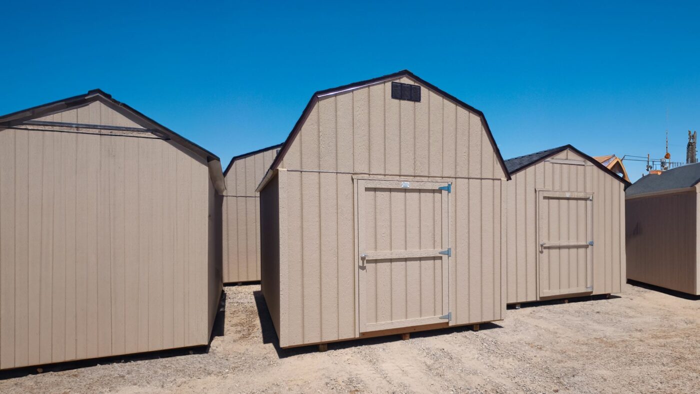 tan stormax value sheds in Visalia CA with brown roofing and details