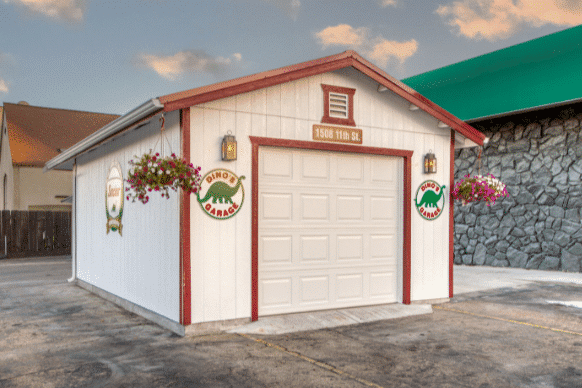 tan one car garage with red trim and hanging flowers featuring custom Dino's Garage signs