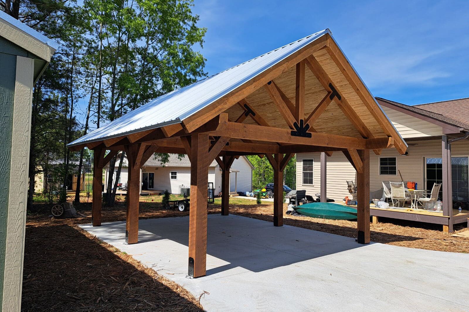 timber frame pavilions in Visalia CA on concrete pad next to home