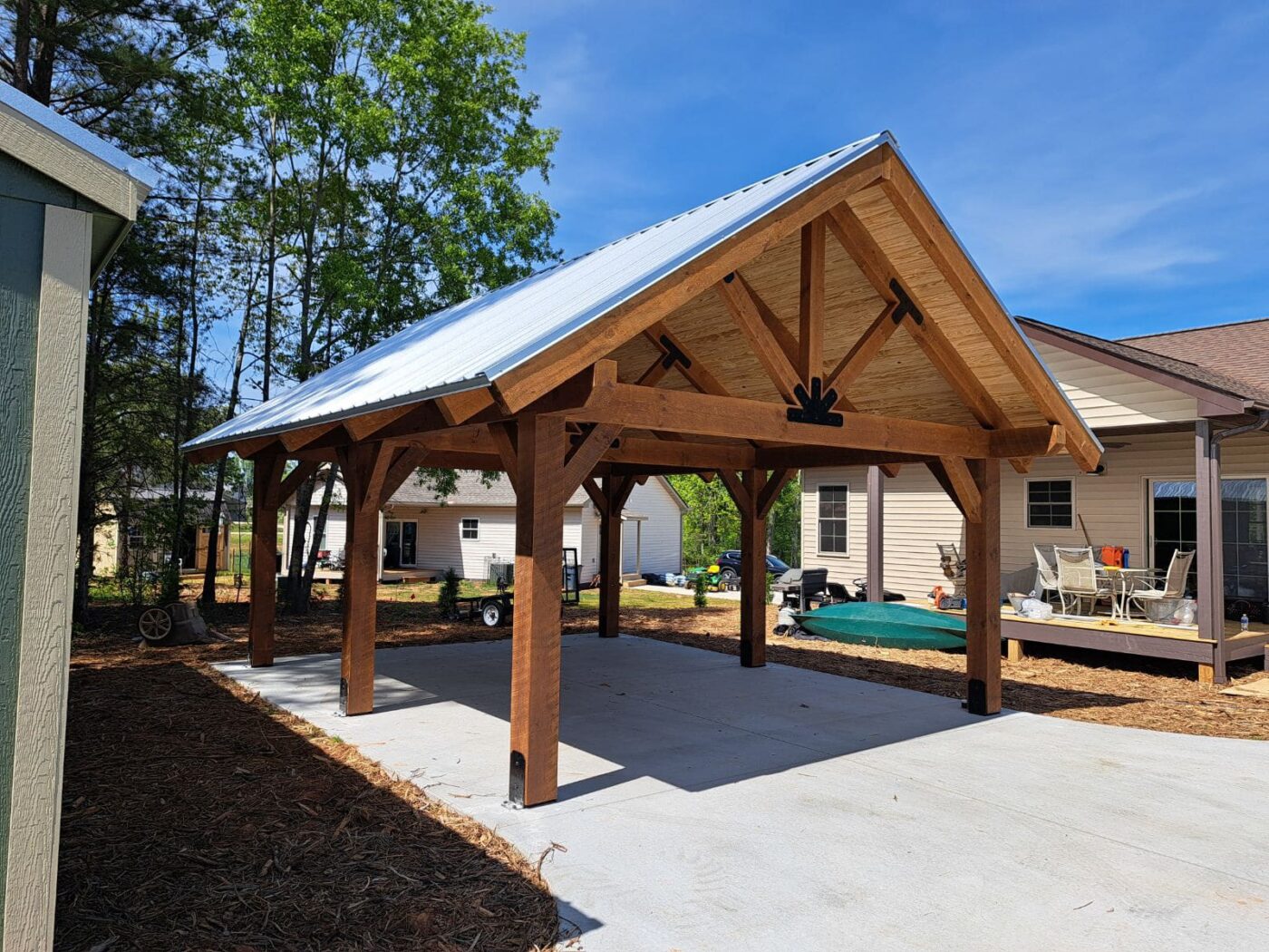 timber frame pavilions for sale in Clovis CA on concrete pad next to home