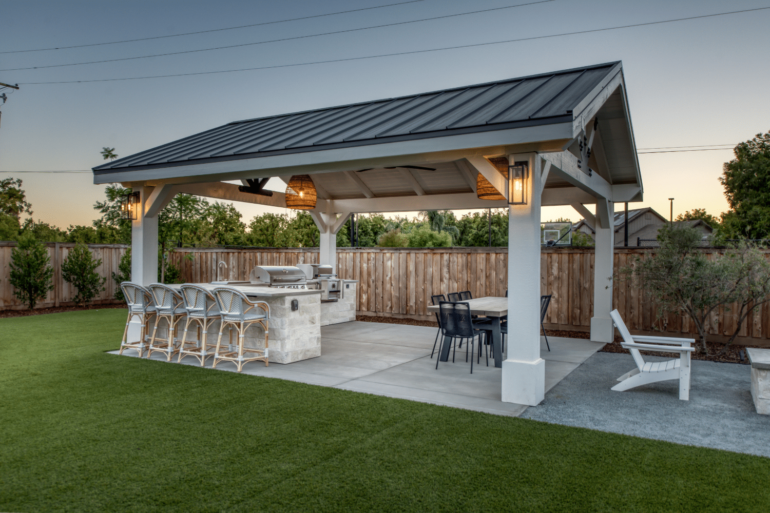 white pavilion with gray roof and kitchen