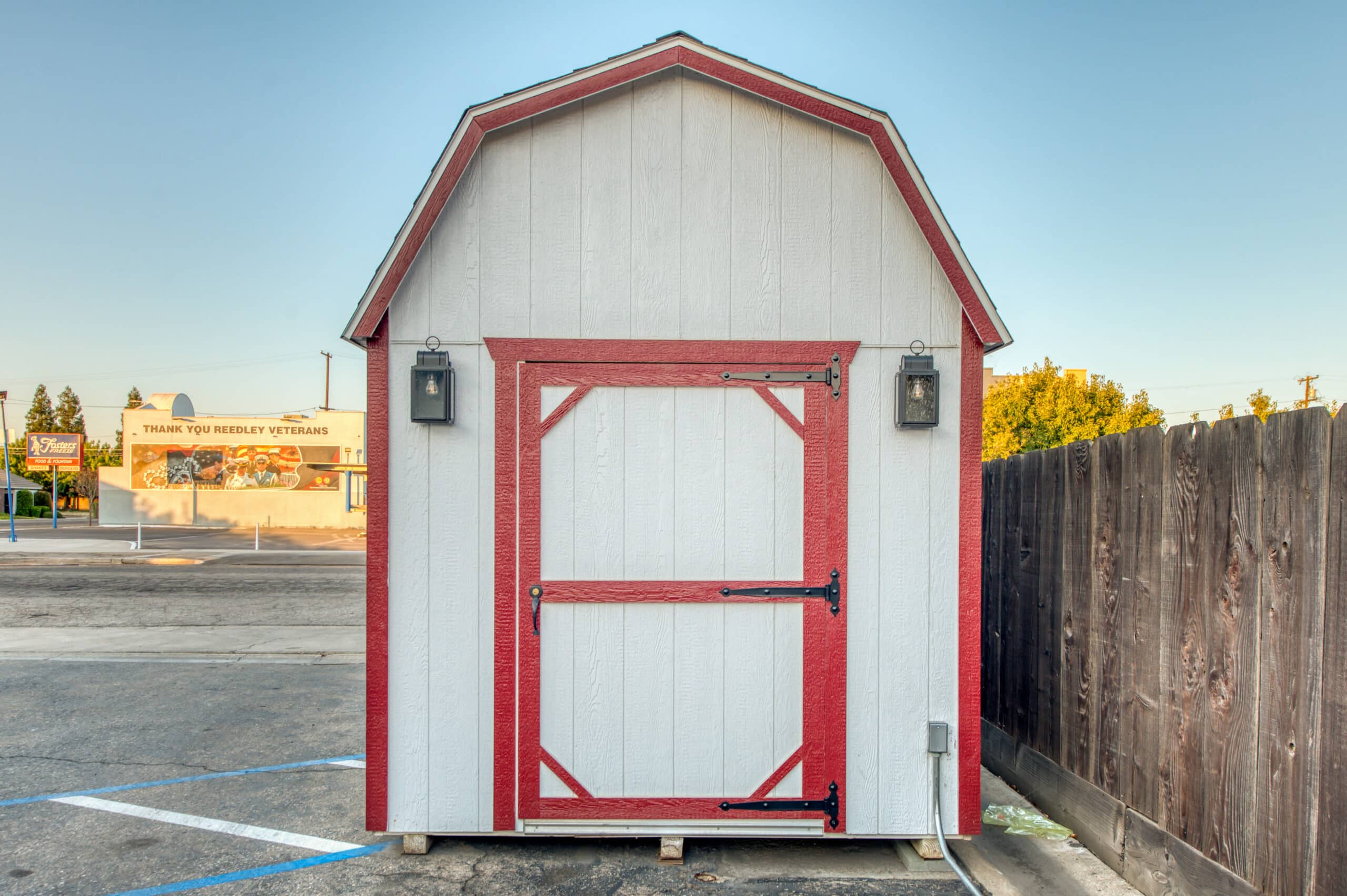 white and red trimmed custom sheds for sale near Madera CA