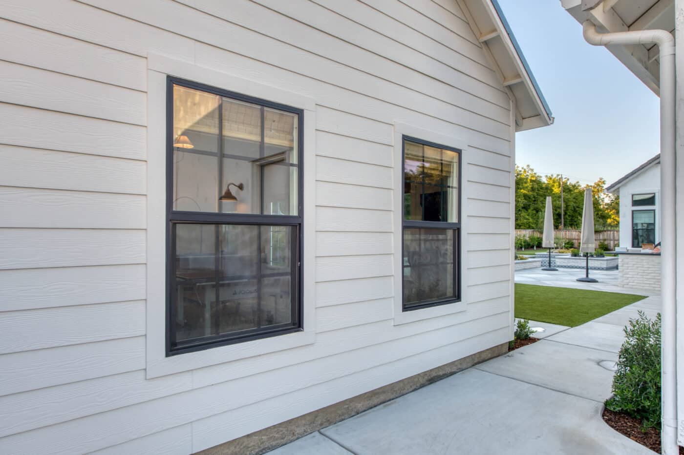 white siding and two windows on a custom cabana near Shaver Lake CA
